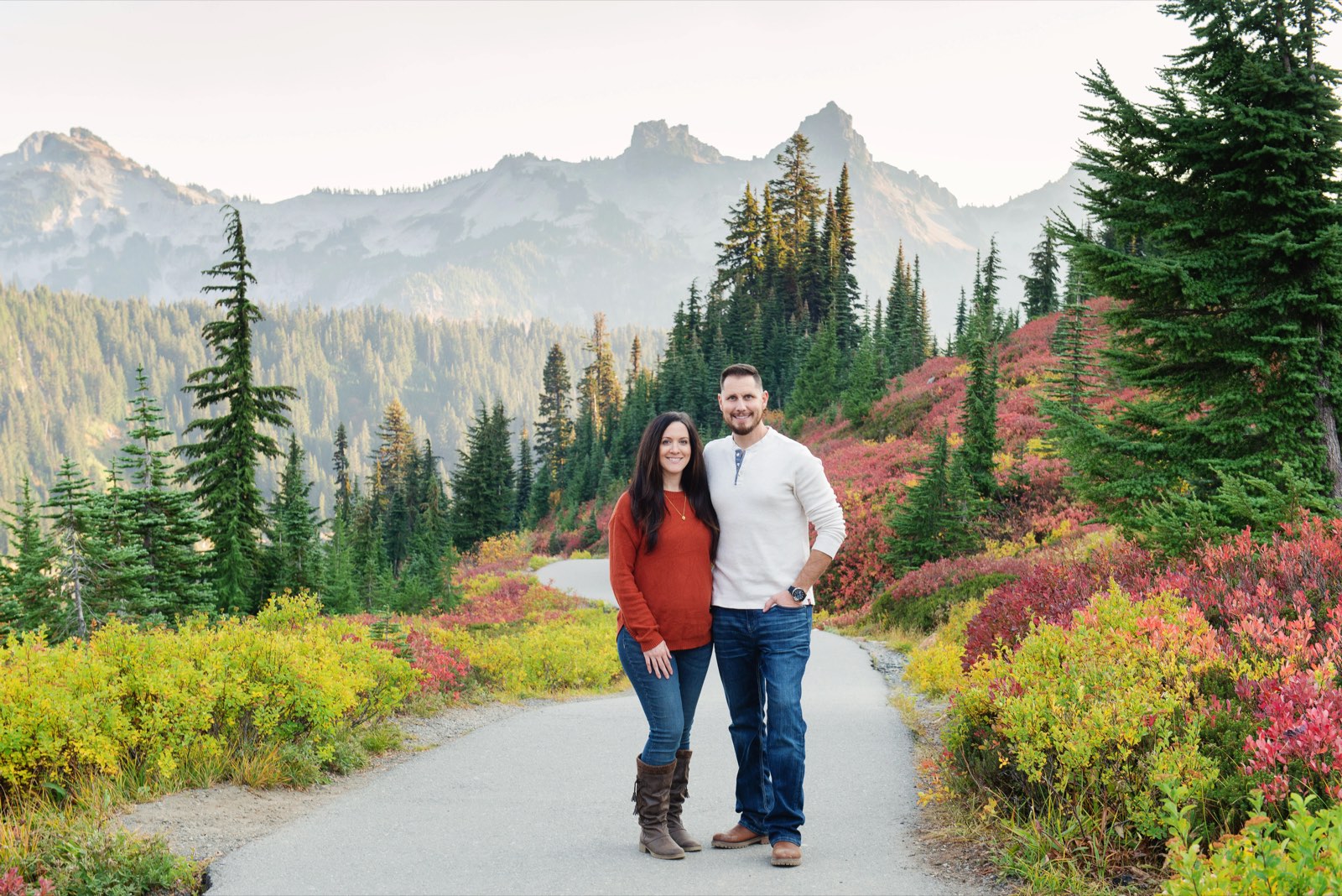 Rob and Emily, owners of Pacific Northwest Couriers, together on a trail
